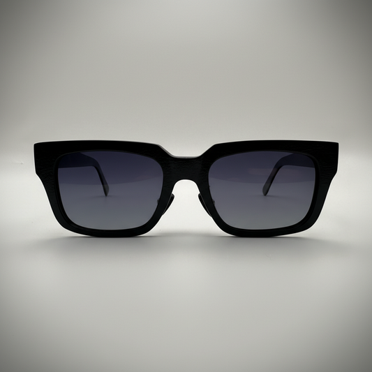 Olivencia ARVEN · NOX handcrafted black horn sunglasses with dark gradient lenses.