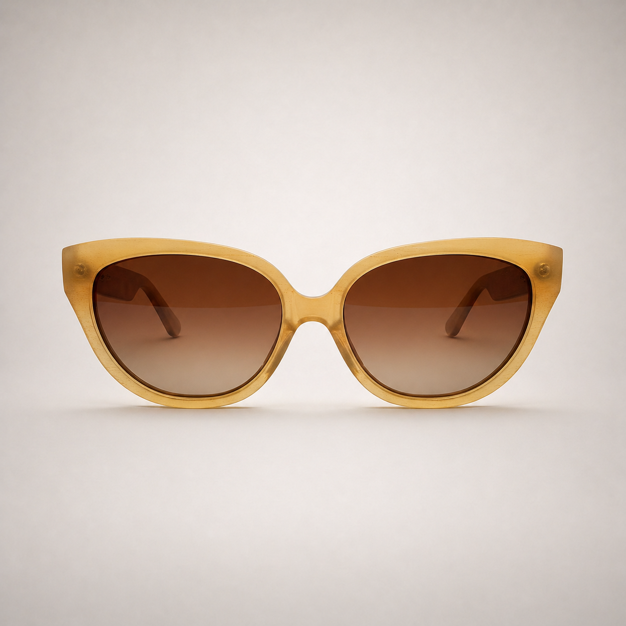 Olivencia LYRA · VELA handcrafted honey horn sunglasses with gradient brown lenses.