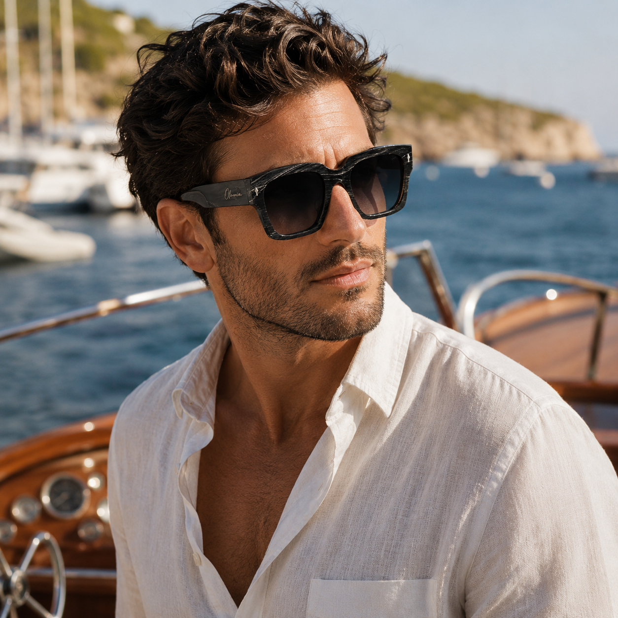 Man wearing Olivencia ORIAN · LINEA handcrafted black horn sunglasses with rare white-line pattern and gradient black lenses.