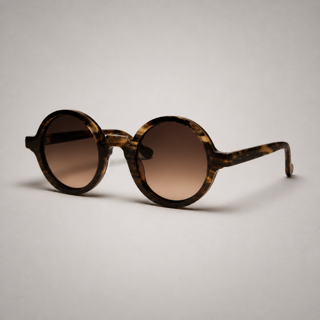 Olivencia SOREL · VIREO handcrafted dark green-black buffalo horn sunglasses with gradient brown lenses, shown at a 45-degree angle.
